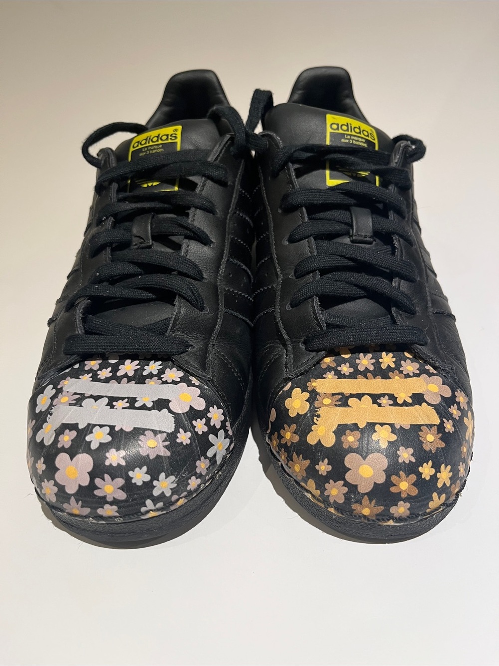 Adidas Superstar shell top Sneakers by Pharrell Williams.